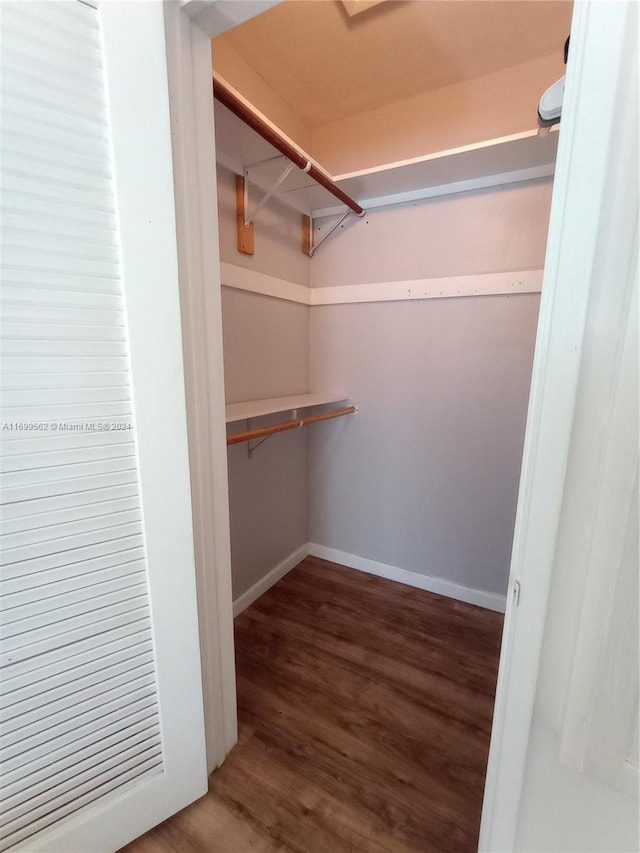 walk in closet featuring hardwood / wood-style floors