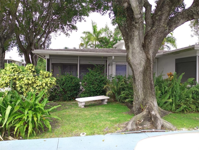 view of front of home with a front yard