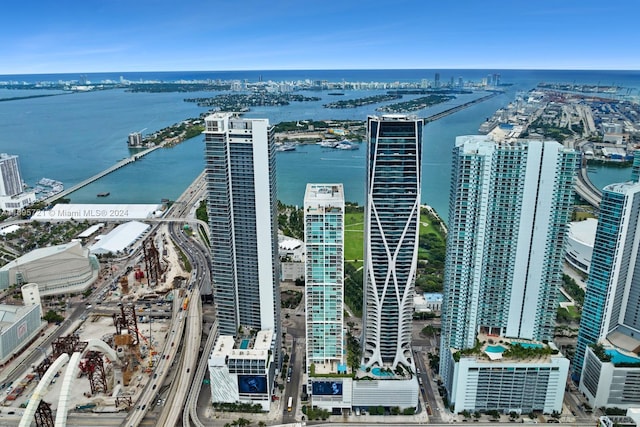 birds eye view of property featuring a water view