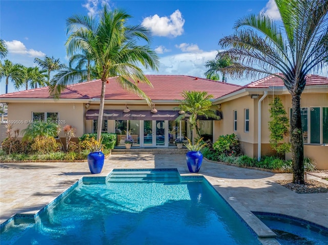 view of pool featuring a patio