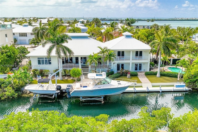 exterior space with a water view