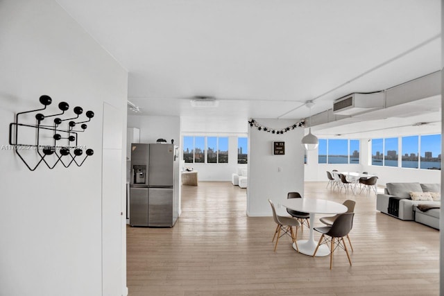 dining area featuring hardwood / wood-style floors