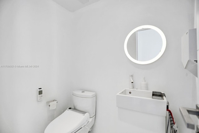 bathroom featuring toilet