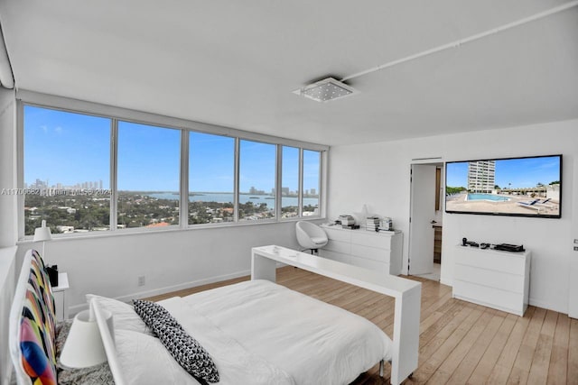 bedroom featuring light wood-type flooring