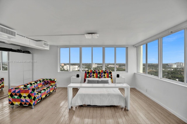 bedroom with light wood-type flooring