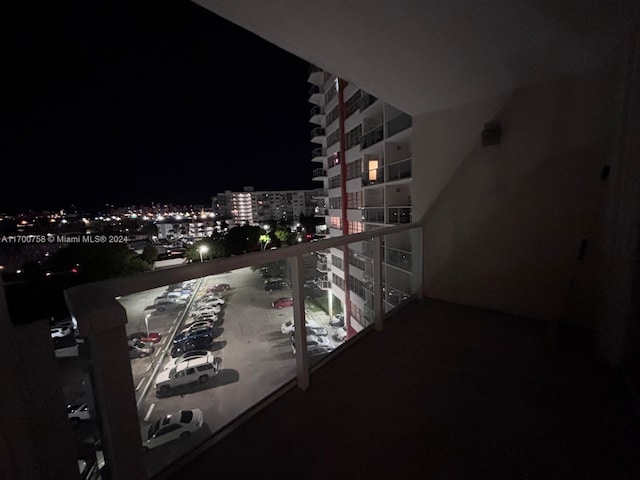 1351 NE Miami Gardens Dr Unit 604E, Miami, FL 33179 - balcony at night with a view of city lights