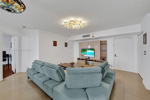 living room featuring light tile patterned flooring