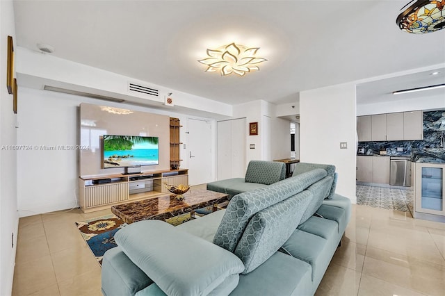 living room with light tile patterned flooring