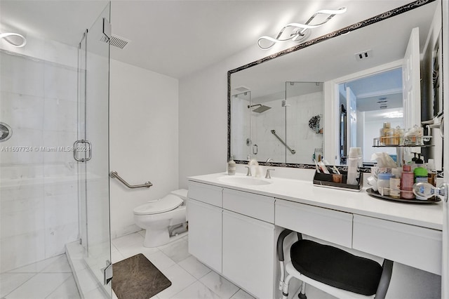 bathroom with tile patterned flooring, vanity, an enclosed shower, and toilet