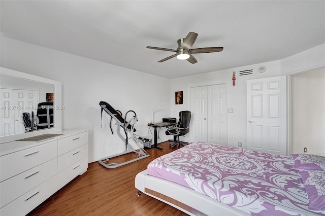 bedroom featuring wood-type flooring and ceiling fan