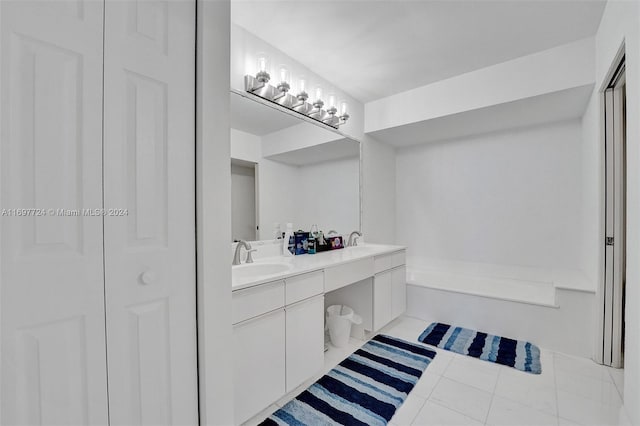 bathroom with tile patterned floors and vanity