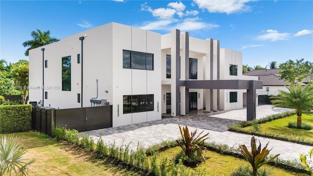 rear view of property featuring a patio area