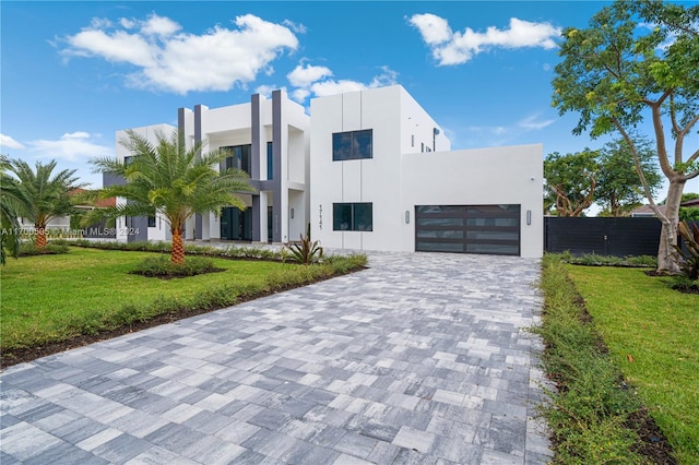 contemporary home featuring a front yard