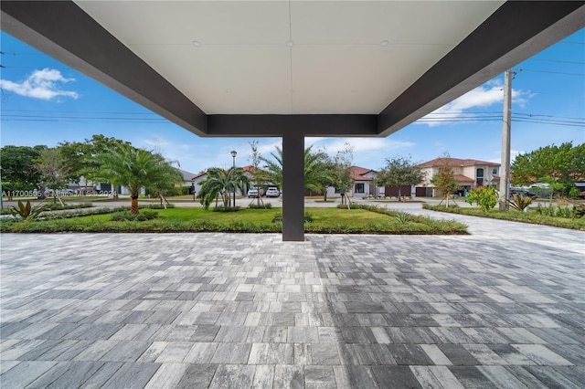 view of property's community featuring a patio area