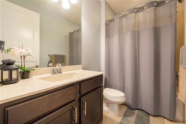 full bathroom with tile patterned flooring, vanity, toilet, and shower / bathtub combination with curtain