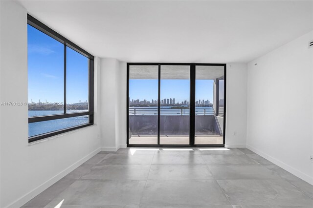 unfurnished living room with wine cooler