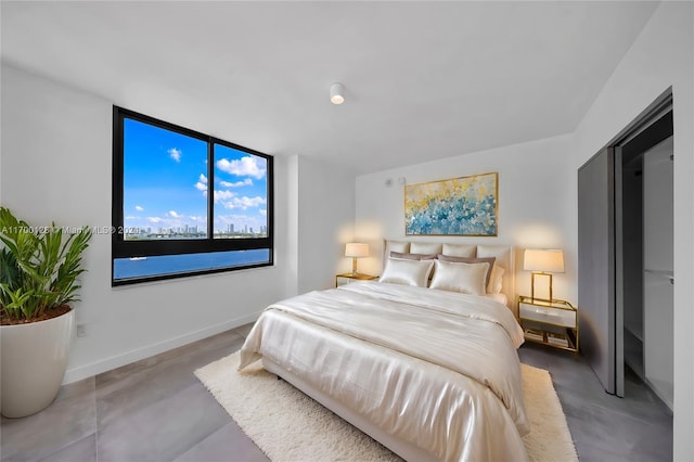 bedroom with concrete floors