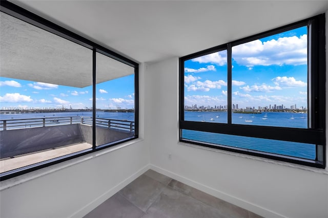 unfurnished room with plenty of natural light