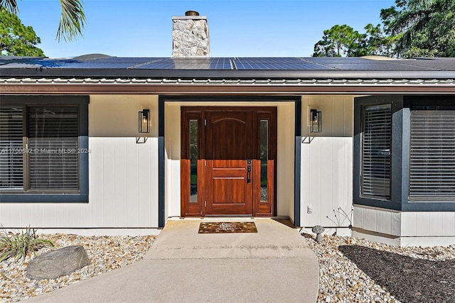 property entrance with a porch