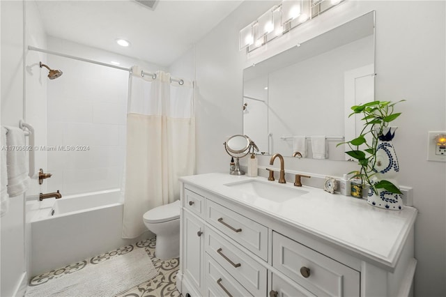 full bathroom with shower / bath combination with curtain, vanity, and toilet