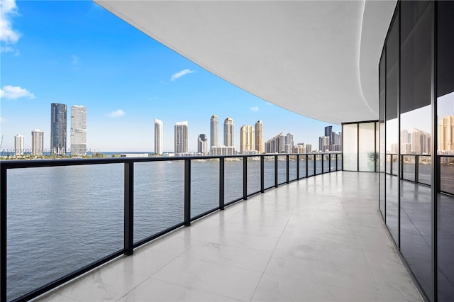 balcony featuring a water view