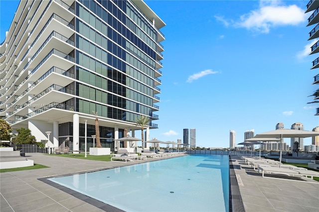 view of swimming pool featuring a patio