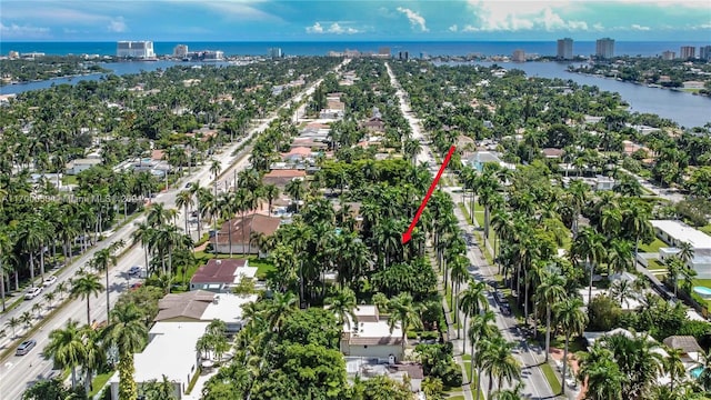 birds eye view of property featuring a water view