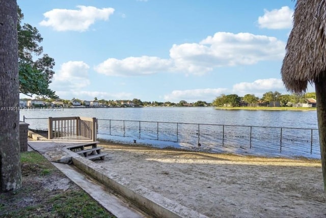 exterior space with a water view