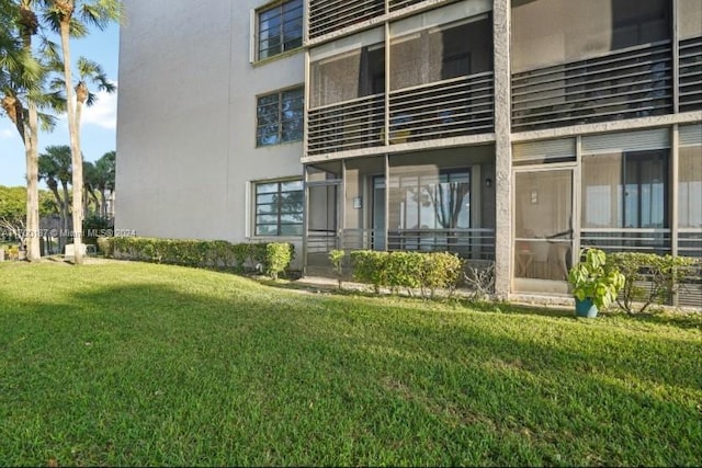 exterior space featuring a lawn