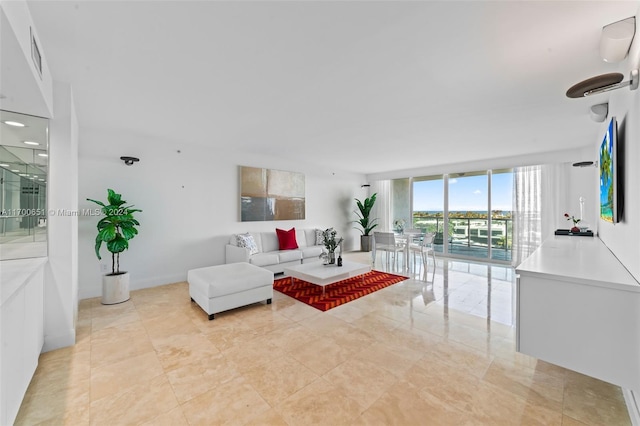 living room with a wall of windows