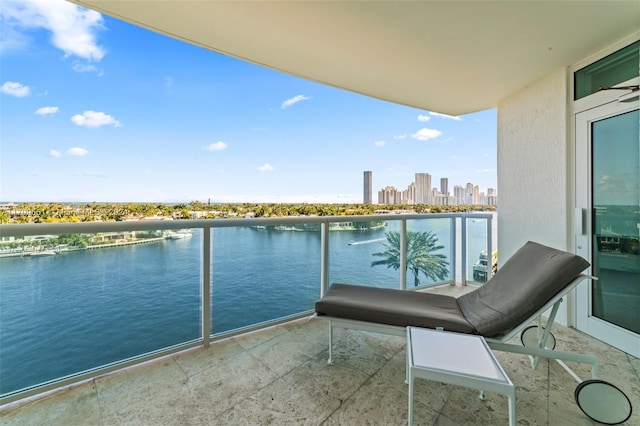 balcony featuring a water view