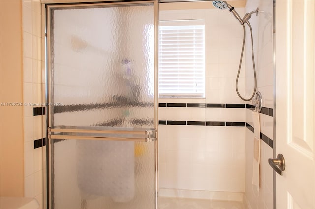 bathroom featuring walk in shower