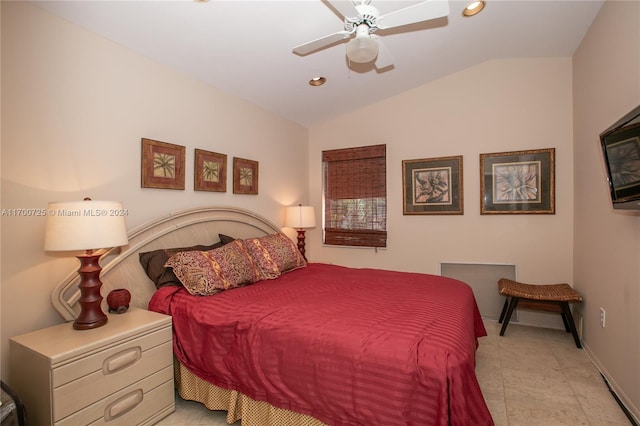 tiled bedroom featuring ceiling fan and vaulted ceiling