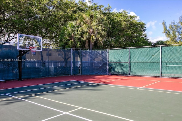 view of sport court featuring basketball hoop