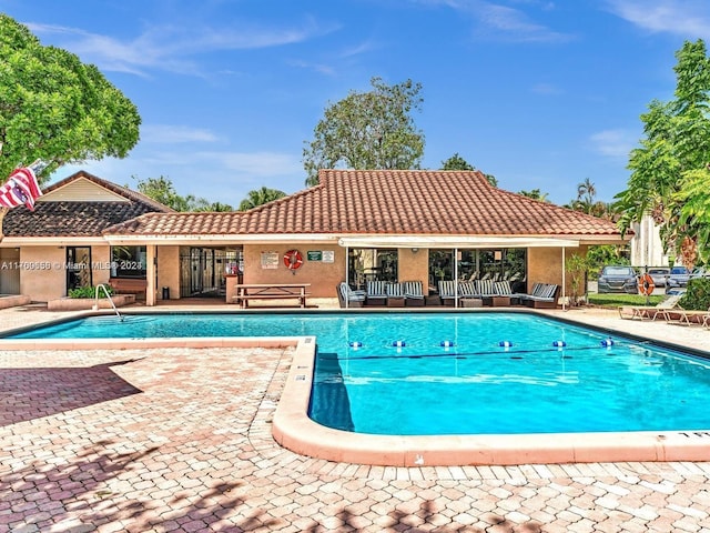 view of swimming pool featuring a patio