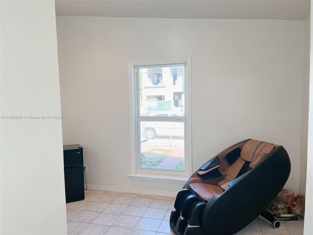 1428 SW 20th St, Miami, FL 33145 - sitting room featuring light tile patterned flooring and healthy amount of natural light