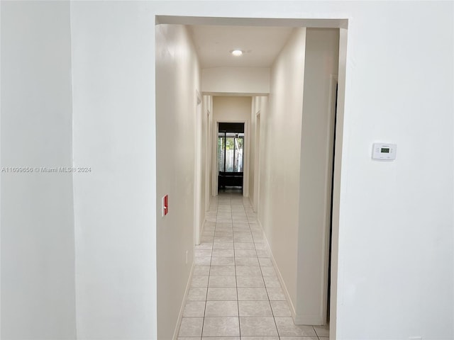 1428 SW 20th St, Miami, FL 33145 - hall with light tile patterned floors and baseboards