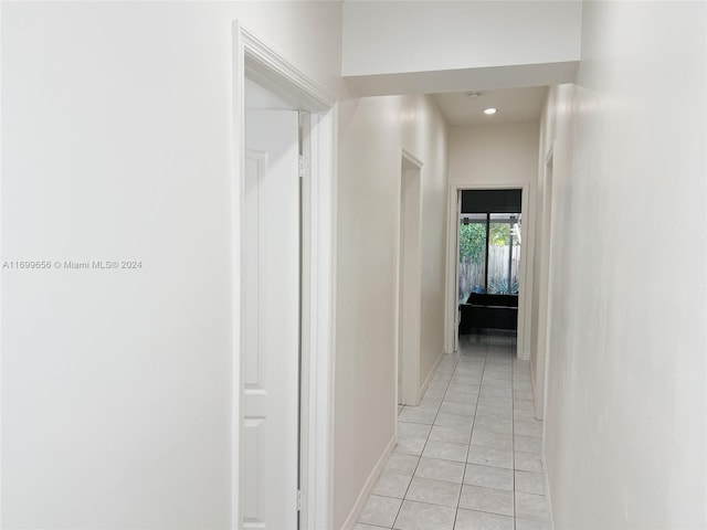 1428 SW 20th St, Miami, FL 33145 - hall with light tile patterned flooring and recessed lighting