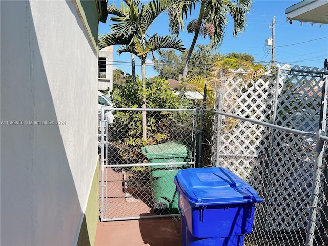 1428 SW 20th St, Miami, FL 33145 - view of patio with a gate
