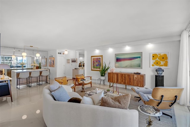 living room with light tile patterned floors