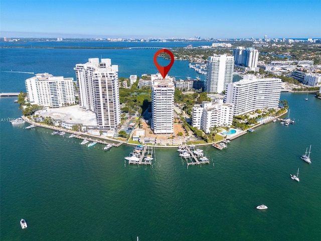 birds eye view of property featuring a water view