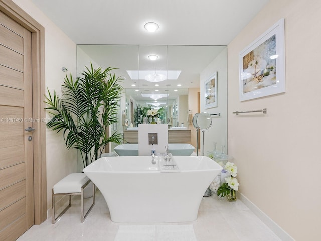 bathroom featuring a bath and vanity