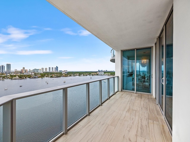 balcony featuring a water view