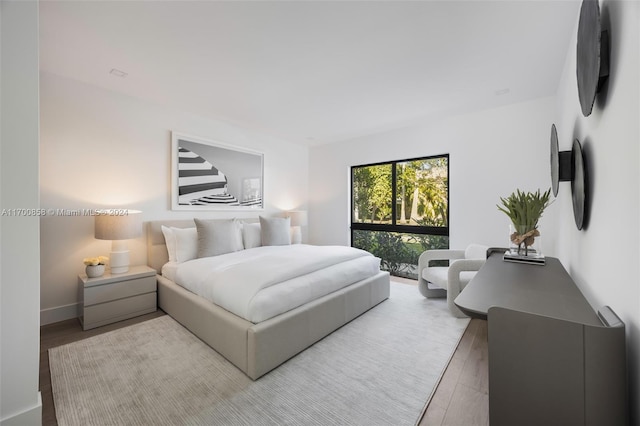 bedroom with wood-type flooring