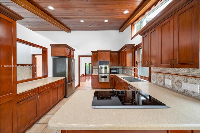 kitchen featuring appliances with stainless steel finishes, backsplash, wood ceiling, and sink