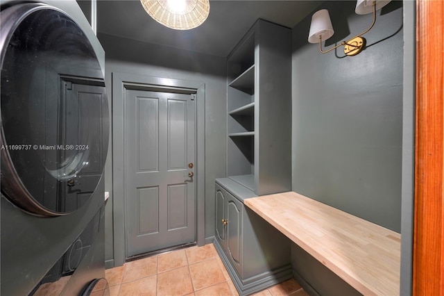 laundry area featuring light tile patterned floors