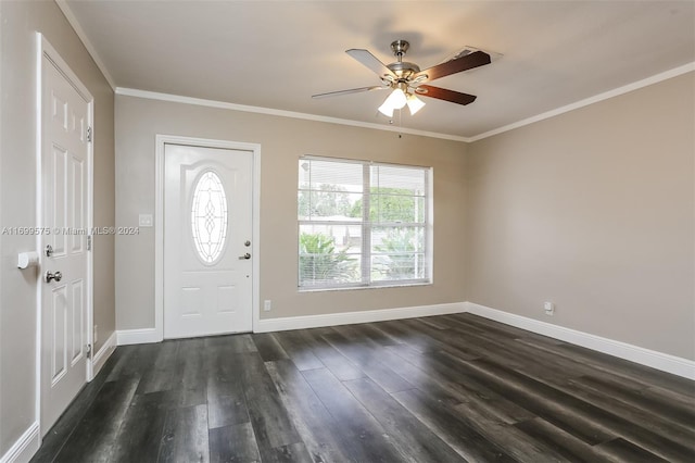 entrance foyer featuring ceiling fan, dark wood-type flooring, and ornamental molding