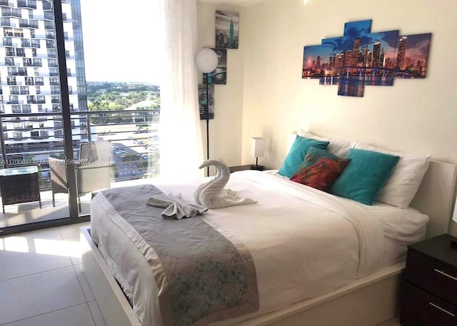 bedroom with light tile patterned floors