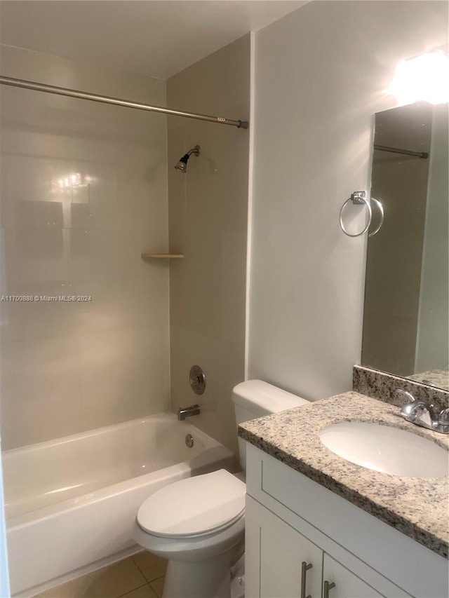 full bathroom featuring tile patterned floors, vanity, shower / bathtub combination, and toilet