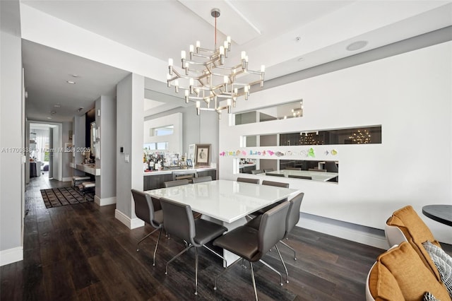 dining space featuring dark hardwood / wood-style floors